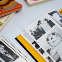 Old photo of person with pumpkin on head